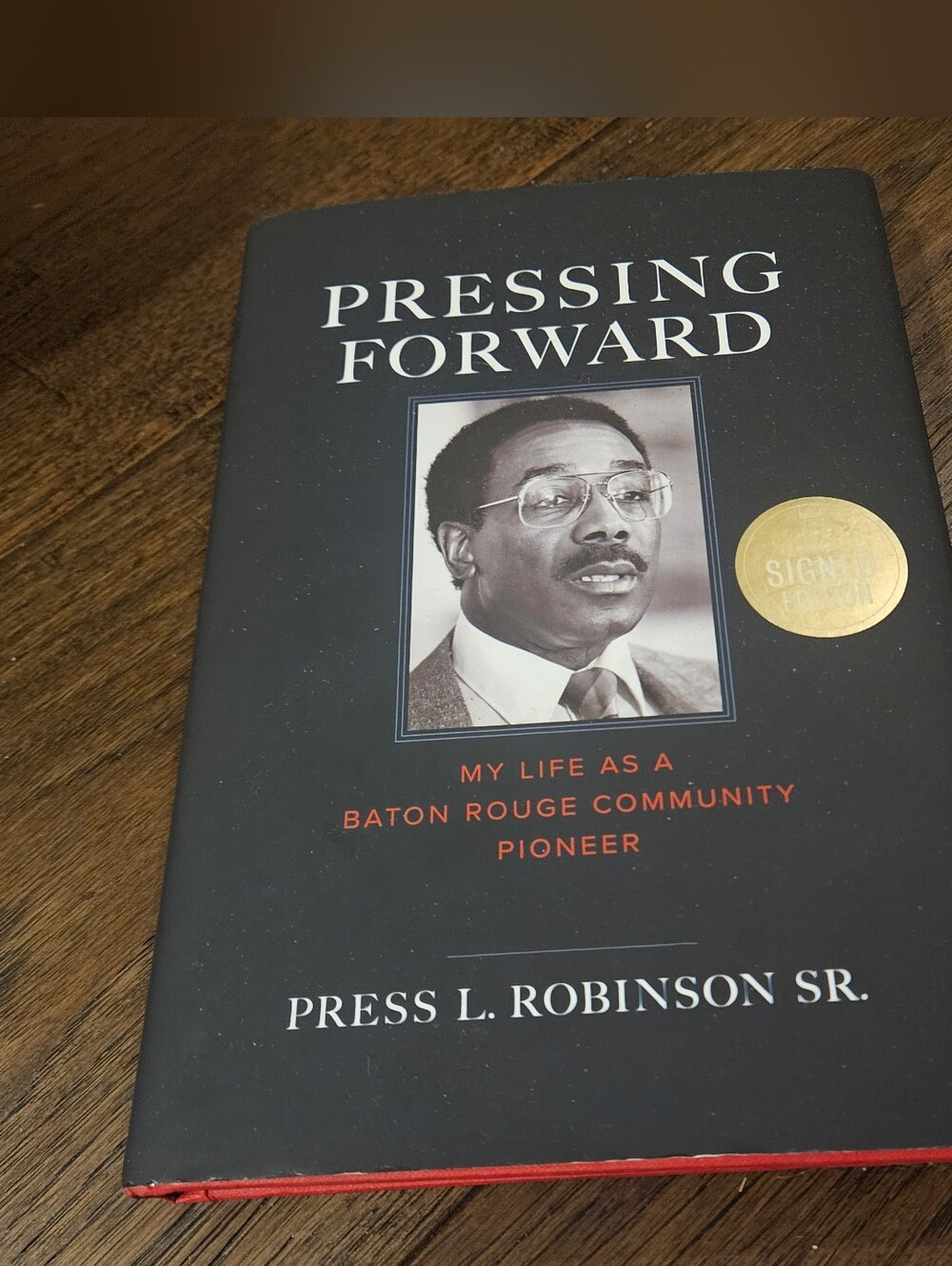 Pressing Forward: My Life as a Baton Rouge Community Pioneer Hardback Signed. 